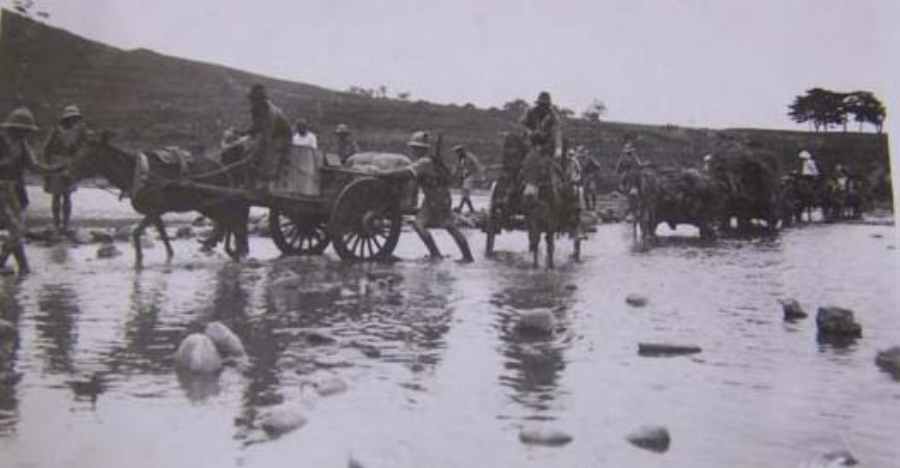Mule carts cross Tashih Ho River