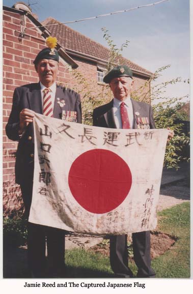 With a captured Japanise flag