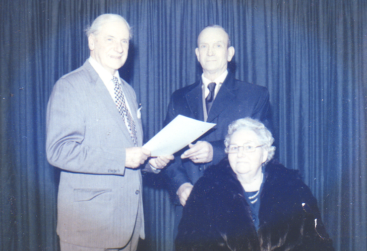 Francis being presented with Retirement Certificate from Plymouth City Councill 1972. ( Lady in front is Nan Margorie Wright)