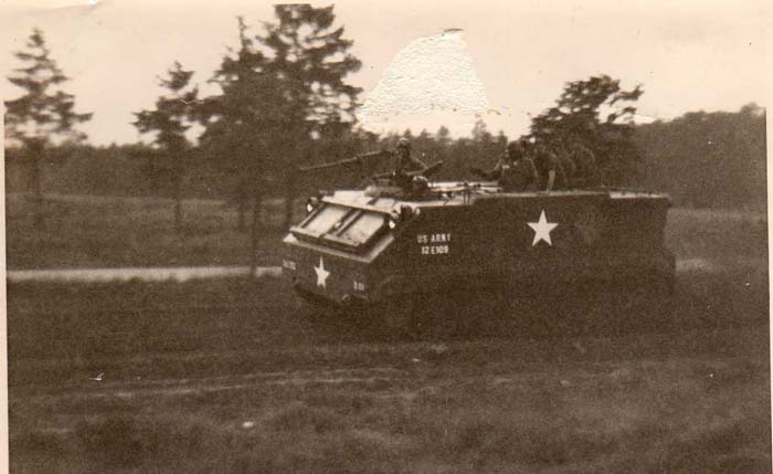 US Army Tracked APC going past